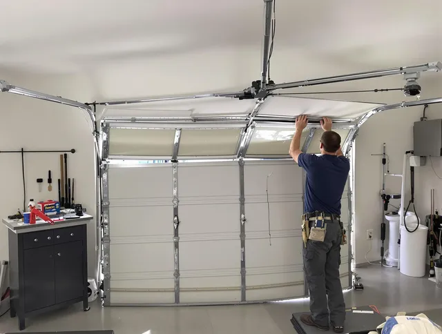 Rialto Garage Door Repair specialist performing precise section replacement on Rialto garage door