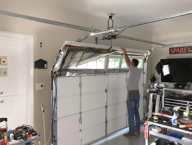 Garage door section replacement by Rialto Garage Door Repair in Rialto