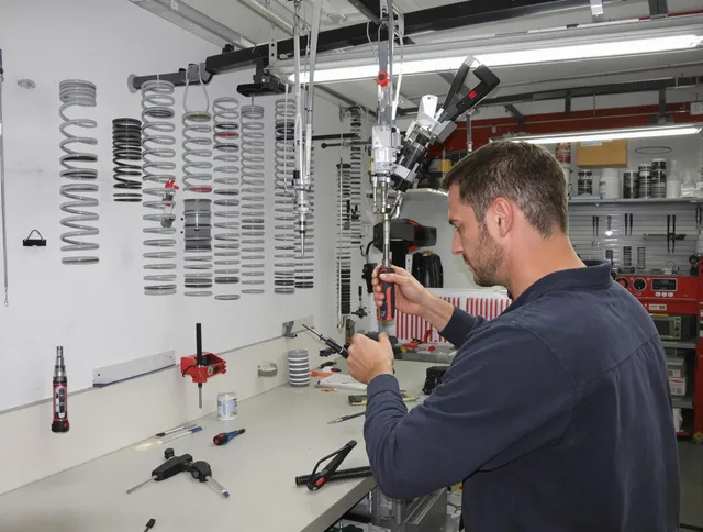 Rialto Garage Door Repair safety certified technician performing precision spring replacement in Rialto